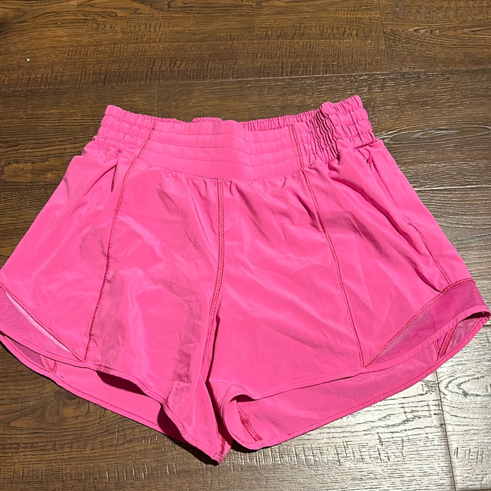 Pow pink lululemon 4 inch hottie hot shorts